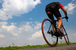a man riding a bike down a road at 066 Villa Mexic 41 ETV8816 by Mallorca Charme in Santa Margalida