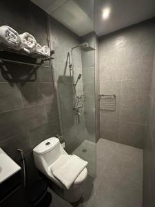 Koupelna v ubytování Coron 180 Hotel + 7 fotografií