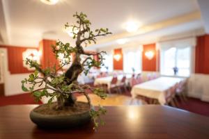 Postel nebo postele na pokoji v ubytování Frederiksværk Hotel