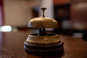 a metal object sitting on top of a table at Frederiksværk Hotel in Frederiksværk