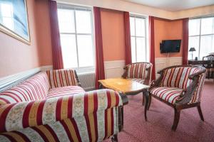 TV a/nebo společenská místnost v ubytování Frederiksværk Hotel