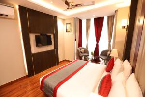 Rúm í herbergi á Hotel The Magic Tree - Paharganj New Delhi