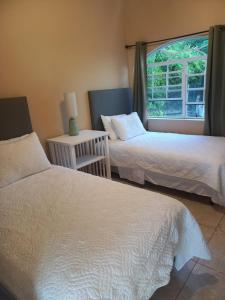 Voodi või voodid majutusasutuse Bellevue hideaway toas