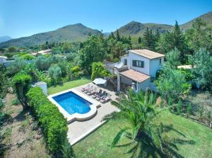 an aerial view of a house with a swimming pool at Owl Booking Villa Bocoris - 15 Min Walk to the Beach in Port de Pollensa