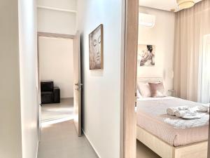 Postel nebo postele na pokoji v ubytování Seaside Deluxe Apartment