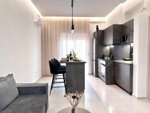 Kuchyň nebo kuchyňský kout v ubytování Seaside Deluxe Apartment