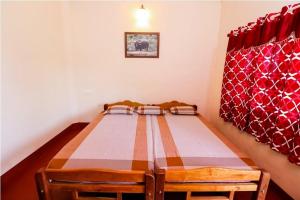 Postel nebo postele na pokoji v ubytování Uttunga Homestay