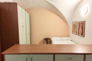 Postel nebo postele na pokoji v ubytování Brigantino - By Ligooria