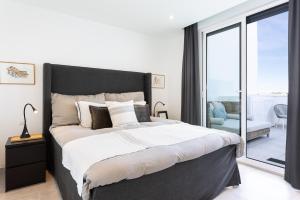 Łóżko lub łóżka w pokoju w obiekcie Penthouse Lord of Mijas , Sea View 6P, Casa Banderas, D23A