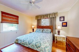 a bedroom with a bed and a ceiling fan at Rehoboth Beach Three7351 Ninth St in Dewey Beach