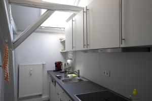 Kuchyň nebo kuchyňský kout v ubytování Brauhaus Suite 19