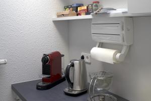 Příslušenství pro přípravu čaje a kávy v ubytování Brauhaus Suite 19