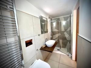 Kúpeľňa v ubytovaní Hotel Pinguino