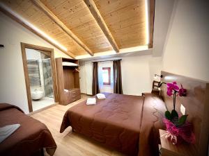 Posteľ alebo postele v izbe v ubytovaní Hotel Pinguino