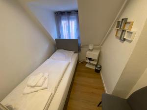 Postel nebo postele na pokoji v ubytování Swan Rooms