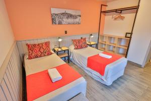 Postel nebo postele na pokoji v ubytování Hotel Bariloche By Tierra Gaucha