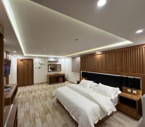 Katil atau katil-katil dalam bilik di فندق وفلل مون تري