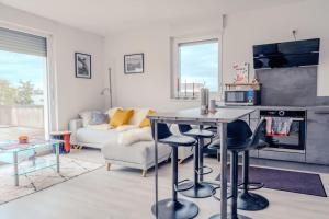 Posezení v ubytování L'Escale Confort + 6 fotografií