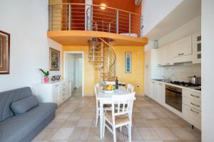 A kitchen or kitchenette at Ombra Verde Residence e B&B