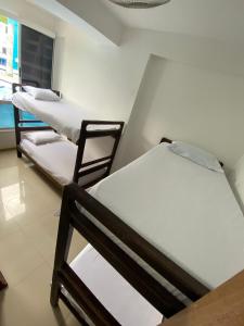 A bed or beds in a room at Condominio Paraíso del Sol