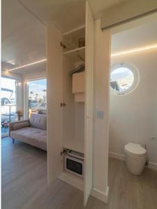 En eller flere senge i et værelse på La Maison de la Mer Sotogrande