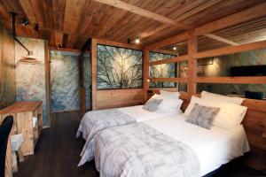 Postel nebo postele na pokoji v ubytování Hotel Cote Brune