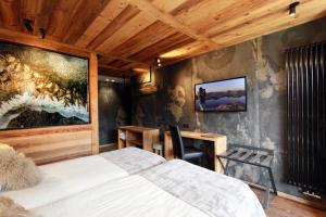 Postel nebo postele na pokoji v ubytování Hotel Cote Brune