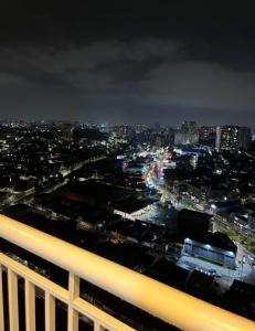 a view of a city at night at Terraço Harmony Flats GRU in Guarulhos