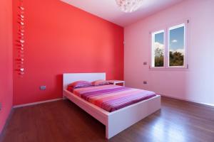 A bed or beds in a room at Villa Daiana by Perle di Puglia Még 22 kép
