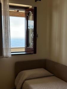 Letto o letti in una camera di Casa Vacanze Il Libeccio