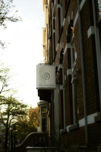 a sign on the side of a building at Hotel 171 in Rotterdam