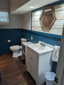 a bathroom with a sink and a toilet at Cozy Family Home in Texas in Fort Worth
