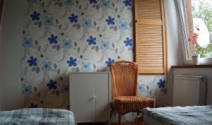 Łóżko lub łóżka w pokoju w obiekcie Domek i Apartamenty Stokrotka