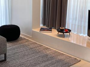 Oleskelutila majoituspaikassa Brasil Suites Boutique Hotel