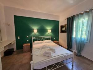 Posteľ alebo postele v izbe v ubytovaní Corfu Dream Holidays Villas Standarts