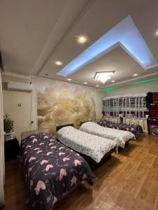 Ένα ή περισσότερα κρεβάτια σε δωμάτιο στο GREEN WEST House