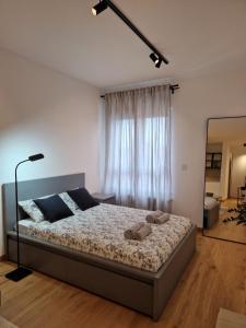 Postel nebo postele na pokoji v ubytování Studio mini54