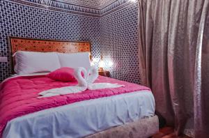 Postel nebo postele na pokoji v ubytování Riad Dar Lalj Fes