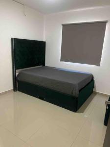 Katil atau katil-katil dalam bilik di Residencia nueva en privada con alberca 5 camas
