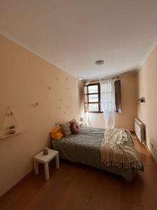 En eller flere senge i et værelse på BEM acogedora y muy céntrica