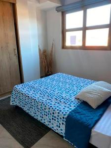 Ένα ή περισσότερα κρεβάτια σε δωμάτιο στο Apartamento 401 - Terraza con Jacuzzi - 3 Habitaciones - Rentas Cortas Gerencial