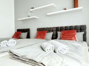Llit o llits en una habitació de Gemütliche Wohnung mit Garten