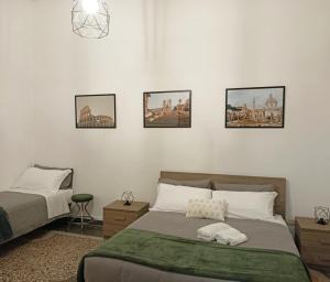 Un ou plusieurs lits dans un hébergement de l'établissement Rome - Termini House