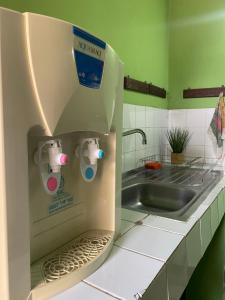 Una cocina o cocineta en Downtown Room