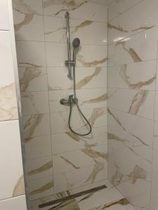 Koupelna v ubytování Apartman + 2 fotografie