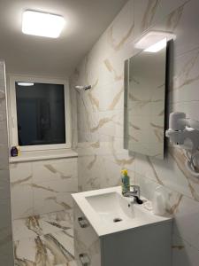 Koupelna v ubytování Apartman