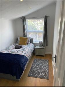 Ένα ή περισσότερα κρεβάτια σε δωμάτιο στο Samarlon Home Saxton