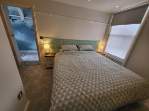 Легло или легла в стая в Sunset Point Apts - Blue Horizon Suite