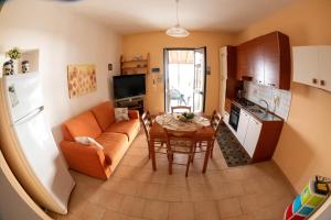 TV i/ili multimedijalni sistem u objektu Casa Giardinello