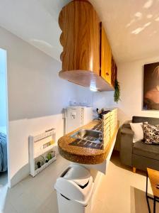 Una cocina o cocineta en Apartaestudio Encanto Pacífico